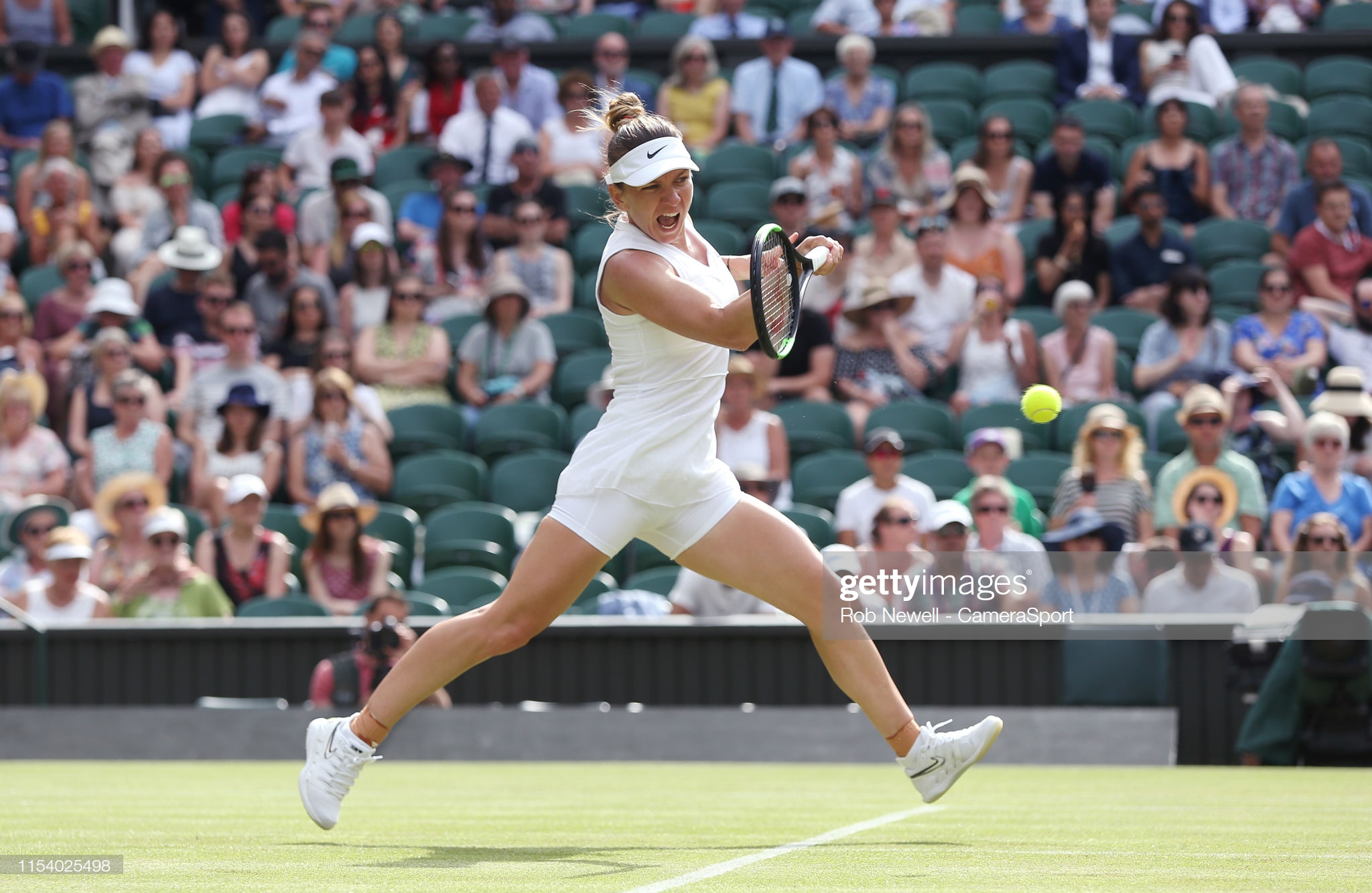 LONDON, ENGLAND - JULY 05: Simona Halep (ROU) during her match against Victoria Azarenka (BLR) in their Ladies' Singles Third Round match during Day 5 of The Championships - Wimbledon 2019 at All England Lawn Tennis and Croquet Club on July 5, 2019 in London, England. (Photo by Rob Newell - CameraSport via Getty Images)